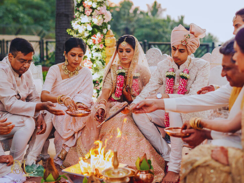 An Indian Wedding performing Hindu rituals in Jim Corbett. the Perfect picture.